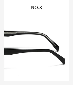 Gros plan des branches noires brillantes avec détail de noyau métallique argenté des lunettes