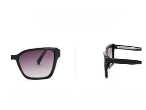 Detail view of large square sunglasses with black frame and purple gradient lenses