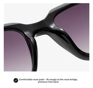 Close-up of integrated nose pads on black square sunglasses with purple gradient lenses