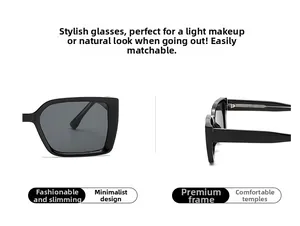 Detail view of rectangular black sunglasses featuring high-gloss frames and grey lenses