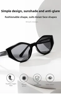 Détail de lunettes de soleil géométriques noires surdimensionnées avec protection UV