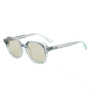 Lunettes de soleil carrées octogonales avec monture bleue transparente et verres jaunes