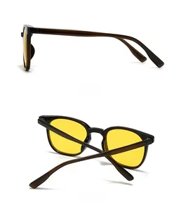 Detail view of square tortoiseshell sunglasses with yellow lenses from side and back angles