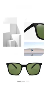 Macro shot of modern black matte sunglasses frame with dark green glass lenses