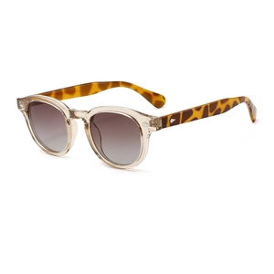 Retro round sunglasses with champagne frames and leopard print temples at a 45-degree angle