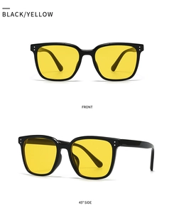 Vue avant et latérale de lunettes de soleil rétro noires avec verres jaunes