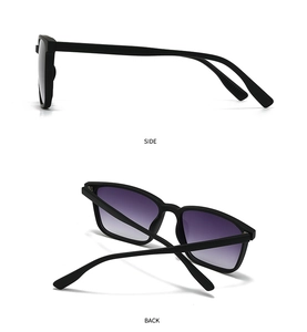 Detail view of retro square sunglasses featuring matte black frames and purple gradient lenses