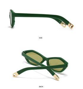 Detail of dark green geometric sunglasses showing decorative gold metal tips on temples