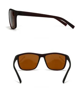 Vue détaillée des lunettes de soleil de sport rouge foncé avec monture texturée et verres ambrés