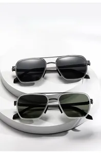 Detail view of narrow metal frames and polarized lenses on sunglasses ZTT010
