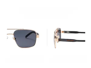 Vue détaillée des lunettes de soleil rétro en métal doré avec verres gris foncé et rayures