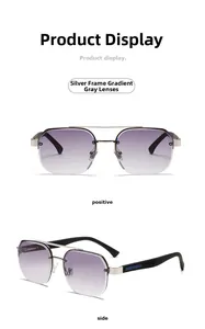 Detail view of silver metal slim frame sunglasses with gradient grey lenses