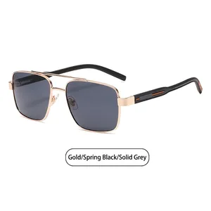 Lunettes de soleil aviateur carrées en métal doré avec branches noires flexibles