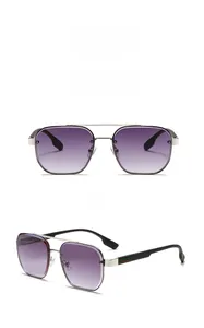 Detail of silver aviator sunglasses with purple gradient lenses and striped temples