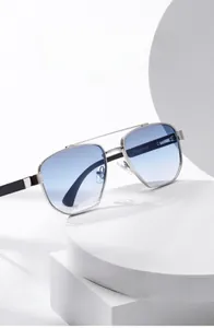 Detail of silver aviator metal frame with blue gradient lenses and temple specifications