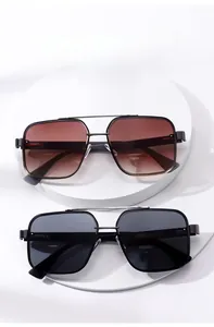 Detail view of retro square sunglasses featuring dual metal bridges and gradient lenses