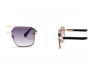 Detail of square gold metal sunglasses with purple gradient lenses and striped temples