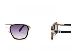 Detail of purple gradient lenses and gold-tone metal temples with tricolor stripe accent