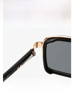 Detailed close-up of matte black frame with durable metal hinge and 140mm temple size
