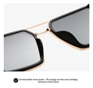 Detailed close-up of comfortable integrated nose pads and gold metal bridge on sunglasses