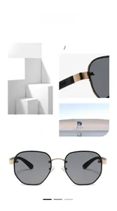Detail of black hexagonal sunglasses with golden metal bridge and side hinge accents