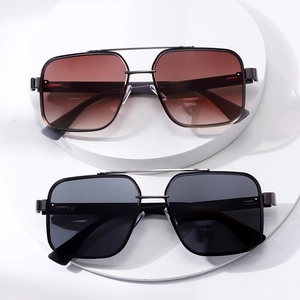 Modern narrow rectangular sunglasses with gradient and black lenses on white pedestals