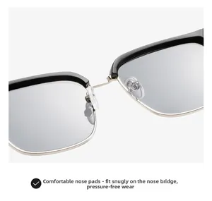 Detailed close-up of comfortable nose pads on black and gold square sunglasses