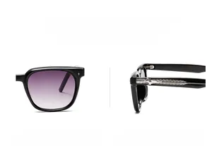 Macro detail of square sunglasses featuring silver metal embossed star on the temple