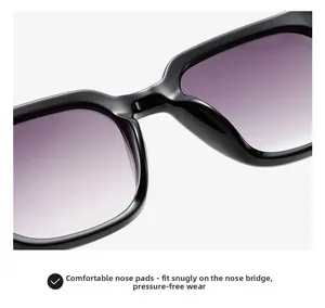 Detail view of integrated comfortable nose pads on black square sunglasses frame