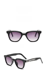 Detailed front and side views of black square sunglasses with gradient lenses and star rivets