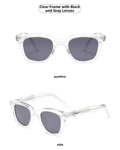 Detail of square sunglasses with transparent frames and star-shaped metal temple accents