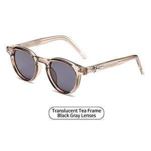 Classic tea-colored square frame sunglasses with grey lenses and star metal accents