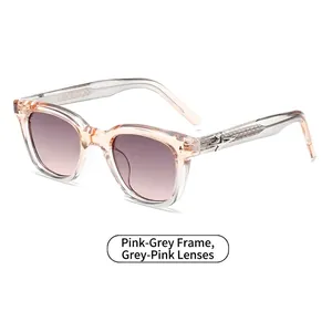 Square pink-grey translucent sunglasses with gradient lenses and silver star detail
