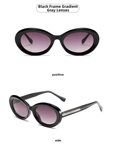 Detail of black rectangular sunglasses with gradient lenses and textured metal hinges
