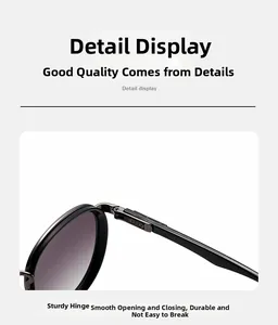 Close-up of the sturdy metal hinge construction on retro round metal sunglasses