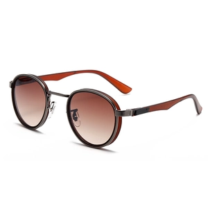 Modern retro round metal sunglasses with amber frames and gradient tea lenses