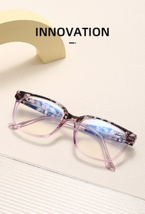 Detailed close-up of fashion eyewear frame with tortoise shell texture and size markings