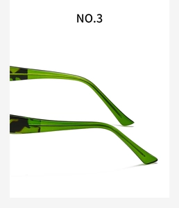 Detailed macro view of green acetate eyewear temples with vintage tortoiseshell tips