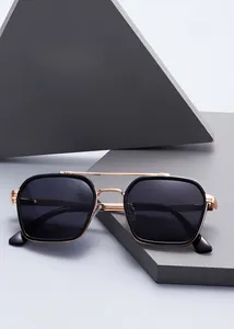 Detail of retro narrow square sunglasses with double bridge metal frame and UV protection