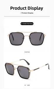 Detail view of vintage narrow rectangular sunglasses in gold and grey finish