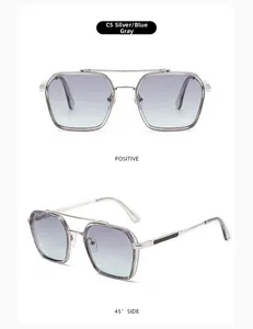 Detail view of silver metal double bridge sunglasses with gradient grey blue lenses