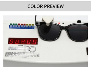 Detail showing UV400 protection test for narrow frame retro sunglasses on testing device