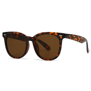 Retro tortoiseshell narrow frame sunglasses with brown lenses and silver diamond rivets