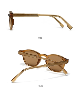 Detail view of tortoiseshell amber sunglasses frame with textured metal inner core on temples