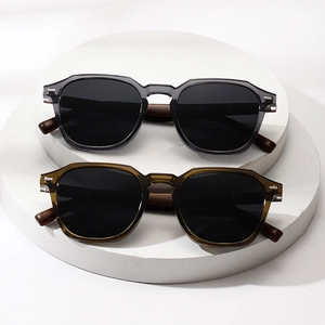 Polarized retro round sunglasses with faux wood temples and stylish transparent frames