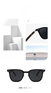 Detail of classic black polarized sunglasses featuring dark wood grain textured temples