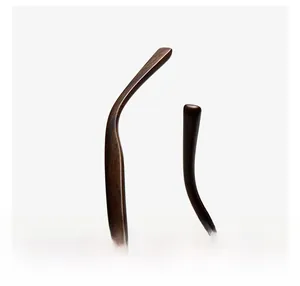 Close-up of ergonomic polarized sunglasses temples with realistic dark brown wood grain texture
