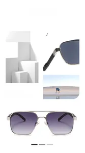 Detail of pilot sunglasses with silver metal frame and gradient purple lenses