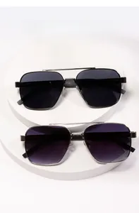 Detailed macro view of trendy slim aviator sunglasses with gradient lenses and metal frame