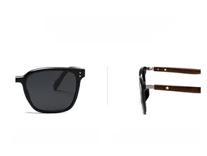 Detail of dark brown wood grain textured temples with metal hole on black round sunglasses